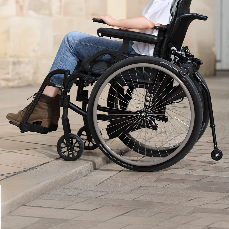 Motorisation pour fauteuil roulant manuel